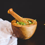Mortar & Pestle with smashed avocado