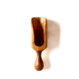 wooden scoop on a white background
