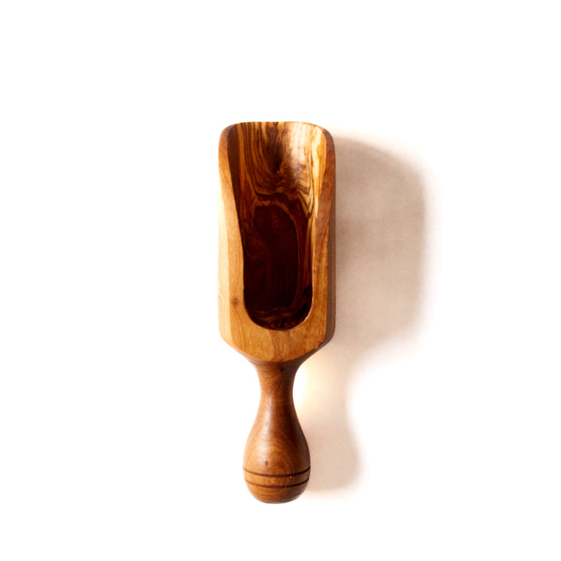 wooden scoop on a white background
