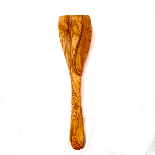 Olive wood spatula on white background