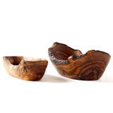 two sizes of live edge wooden bowls on a white background