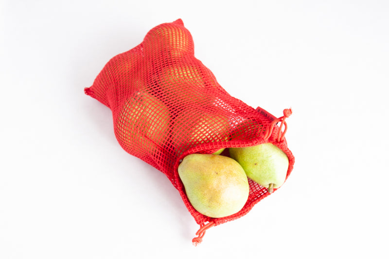 red mesh bag with pears