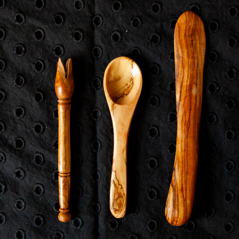 Small Olive Wood Serving Utensils on black lace tablecloth